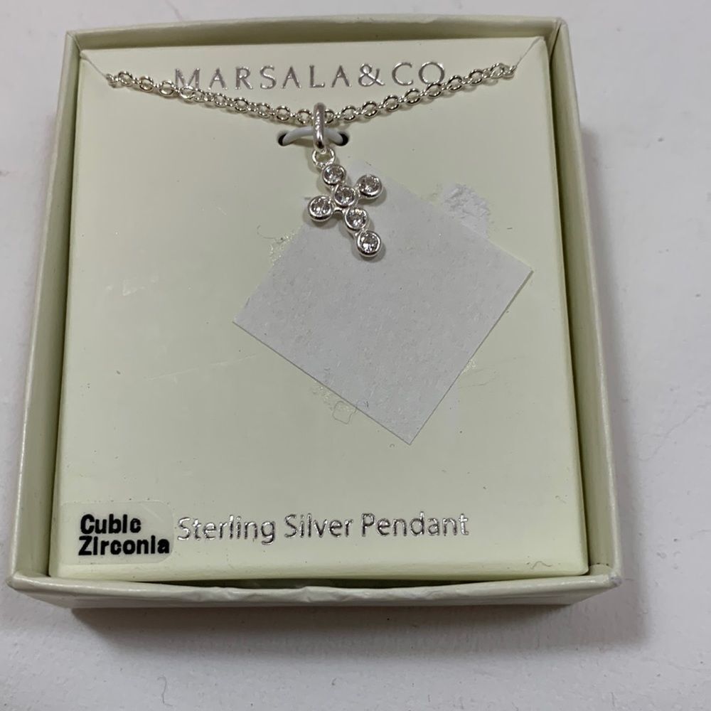 Sterling silver Cross pendant with silver plated brass chain.  New with tags